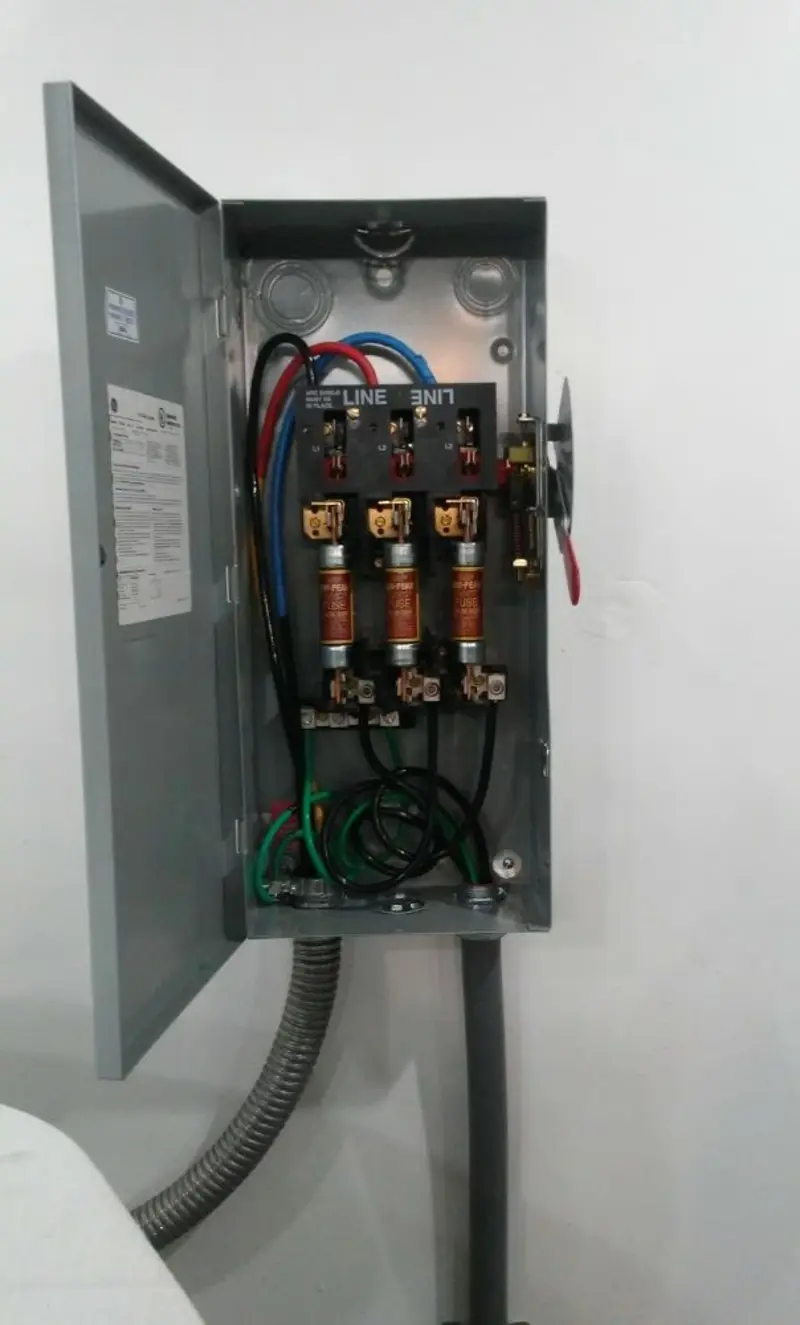 Three-phase disconnect switch installed for Smoke Detector Installation in Rayne